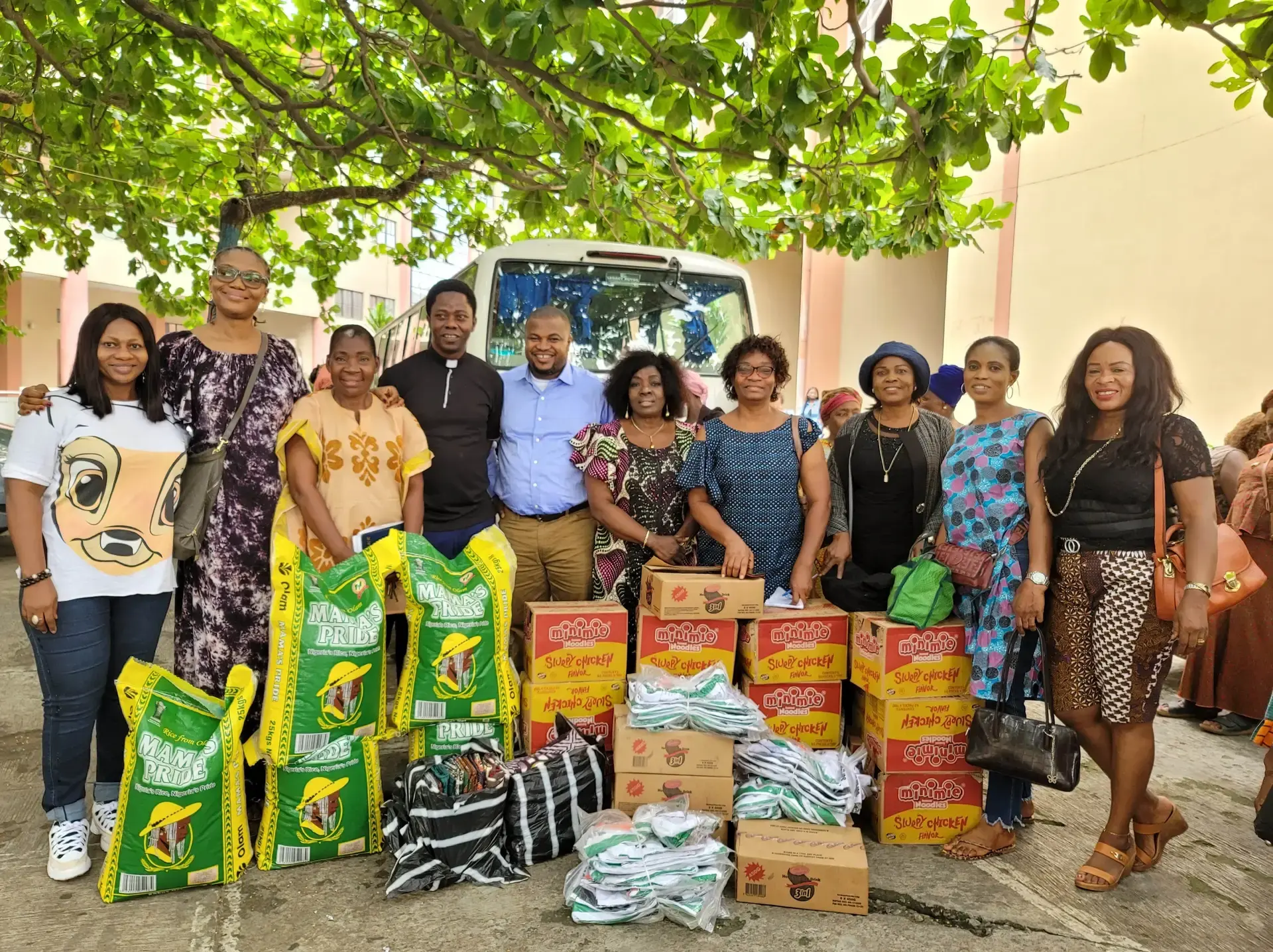 Women and volunteers with relief supplies